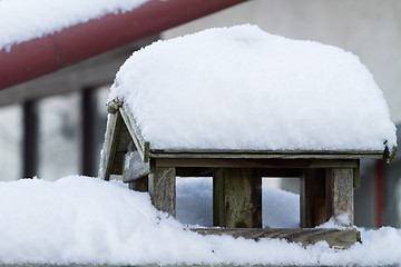 Image showing Bird house with snow cover