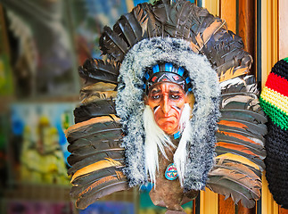 Image showing Mask Indians, decorated with fur and feathers.