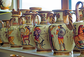 Image showing Ceramic vases with painted antique subjects.