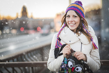 Image showing Winter woman with colorfull hat in city