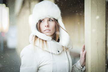 Image showing Winter girl in warm clothes snowy day