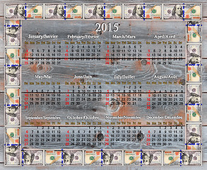 Image showing calendar for 2015 in the dollars' frame on board