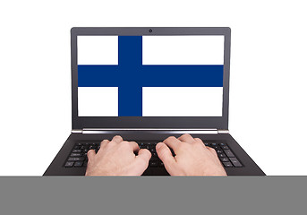 Image showing Hands working on laptop, Finland