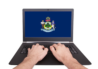 Image showing Hands working on laptop, Maine