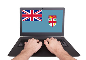 Image showing Hands working on laptop, Fiji