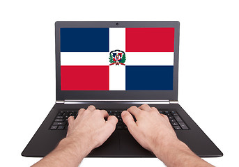 Image showing Hands working on laptop, Dominican Republic