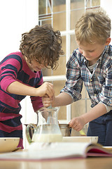 Image showing Kids whisking batter