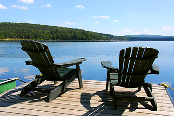 Image showing Chairs on dock