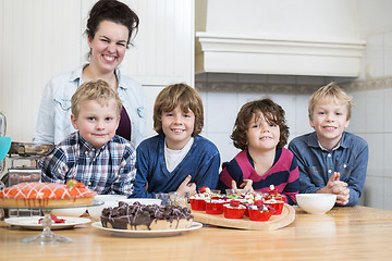 Image showing Making pies at a birthday party