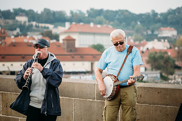 Image showing Street Buskers performing jazz songs on the Charles Bridge in Pr