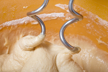 Image showing Kneading a dough with a machine 