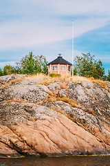 Image showing Yellow Finnish Lookout Wooden House On Island In Summer