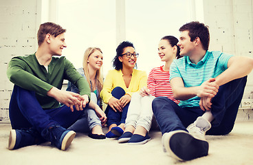 Image showing five smiling teenagers having fun at home