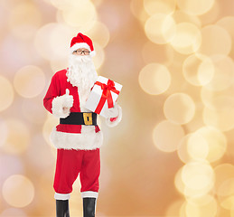 Image showing man in costume of santa claus with gift box