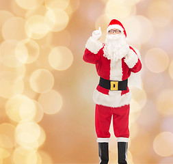 Image showing man in costume of santa claus with bag