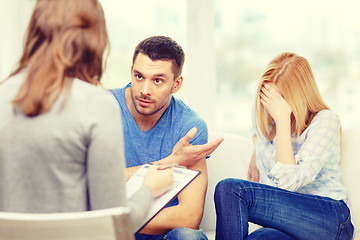 Image showing young couple with a problem at psychologist office