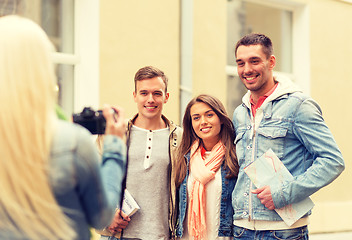 Image showing group of smiling friends taking photo outdoors