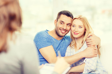 Image showing young couple hugging at psychologist office