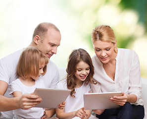 Image showing happy family with tablet pc computers