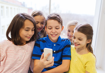 Image showing group of school kids taking selfie with smartphone