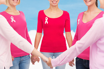 Image showing close up of women with cancer awareness ribbons