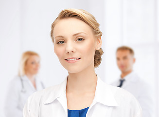 Image showing smiling young female doctor in hospital