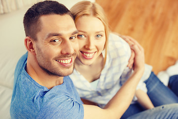 Image showing smiling happy couple at home