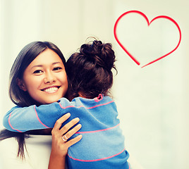 Image showing hugging mother and daughter