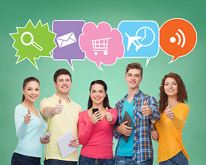 Image showing group of teenagers with smartphones and tablet pc