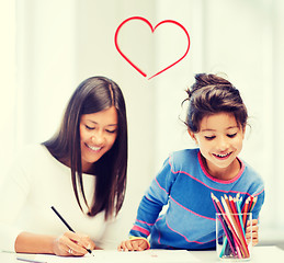 Image showing mother and daughter drawing