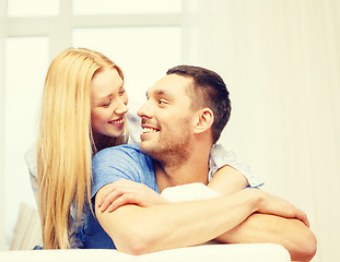 Image showing smiling happy couple at home