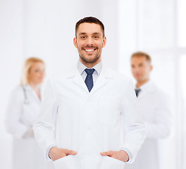 Image showing smiling male doctor in white coat