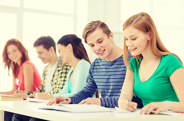 Image showing students with textbooks and books at school