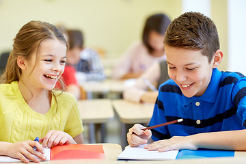 Image showing group of school kids writing test in classroom