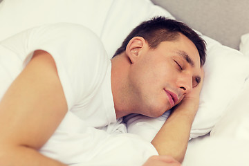 Image showing handsome man sleeping in bed