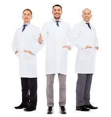 Image showing smiling male doctors in white coats
