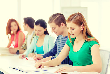 Image showing students with textbooks and books at school