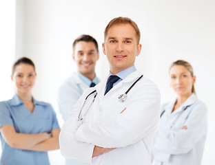 Image showing smiling male doctor with stethoscope