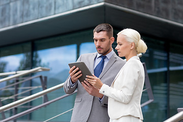 Image showing businesspeople with tablet pc outdoors