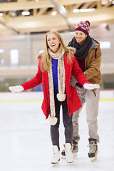 Image showing happy couple on skating rink