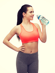 Image showing sporty woman with water bottle