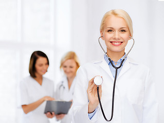Image showing smiling female doctor with stethoscope