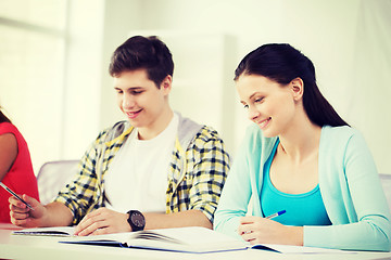 Image showing students with textbooks and books at school