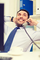 Image showing smiling businessman or student with computer