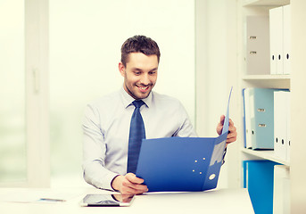 Image showing businessman with folder and tablet pc computer