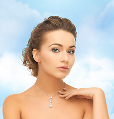 Image showing woman wearing shiny diamond pendant