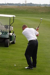 Image showing Male golfer playing golf