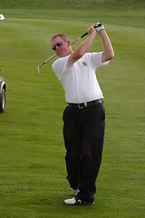 Image showing Male golfer playing golf