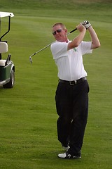 Image showing Male golfer playing golf