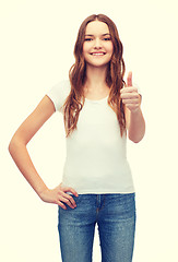 Image showing smiling teenager in blank white t-shirt